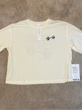 Lululemon jersey training, long sleeve graphic size 4 & 8 NWT barbell baddie